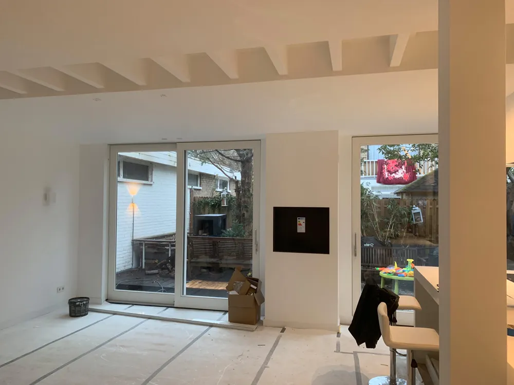 Verbouwde woning in Amsterdam West met moderne uitbouw